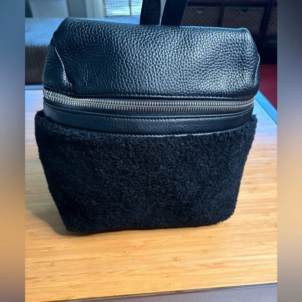 EUC KARA- Small Backpack in Black Shearling and Pebbled Leather.